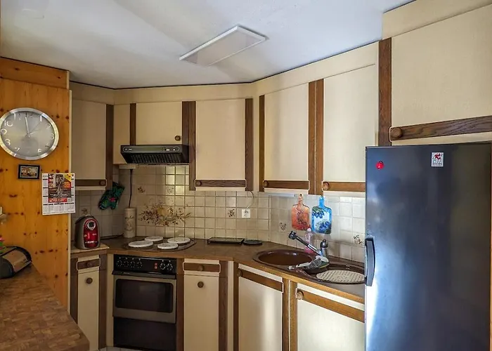 Above The Rooftops - Mountain Panorama